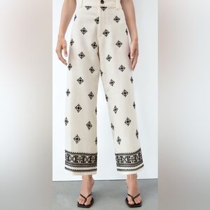 Off White linen pants with black embroidery